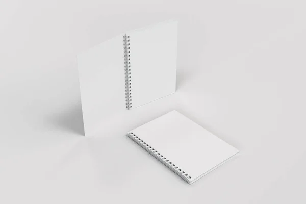 Dois cadernos com encadernação em espiral em fundo branco — Fotografia de Stock
