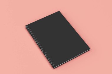 Kapalı defter spiral kırmızı zemin üzerine bağlı