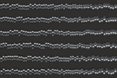 Fırçalanmış metal silindir tablet siyah arka plan üzerine desen