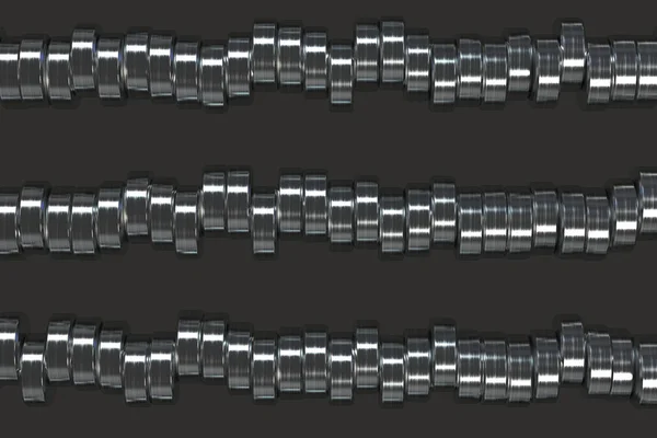 Pattern of brushed metal cylinder tablets on black background