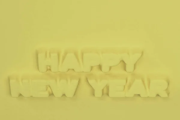 Yellow Happy New Year words bas-relief