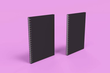 Menekşe arka plan üzerinde iki defter spiral ile bağlı