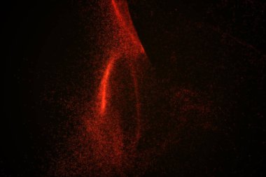 Arka plan kırmızı parlayan parçacıkların yapılmış