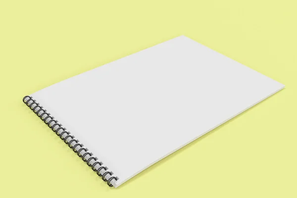 Κενή άσπρη σημειωματάριο με μαύρο σπιράλ σε κίτρινο backgroun — Φωτογραφία Αρχείου