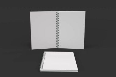 Siyah arka plan üzerine iki defter spiral ile bağlı