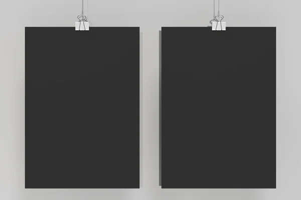 Dois cartazes pretos em branco com mockup do grampo do ligante no backgro branco — Fotografia de Stock