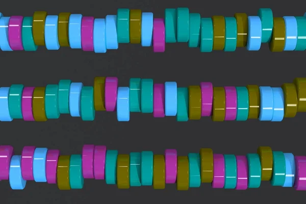 Wzór, niebieski, fioletowy i zielony cylinder tabletek na czarny grzbiet — Zdjęcie stockowe