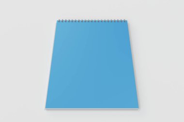 Beyaz arka plan üzerinde boş mavi defter metal spiral ile bağlı
