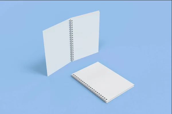 Dois cadernos com encadernação em espiral em fundo azul — Fotografia de Stock