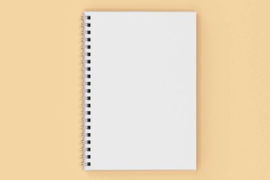 Garı defter spiral turuncu zemin üzerine bağlı