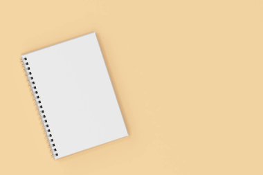 Garı defter spiral turuncu zemin üzerine bağlı