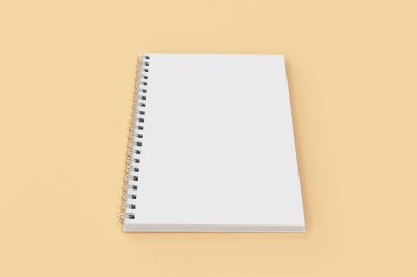 Garı defter spiral turuncu zemin üzerine bağlı