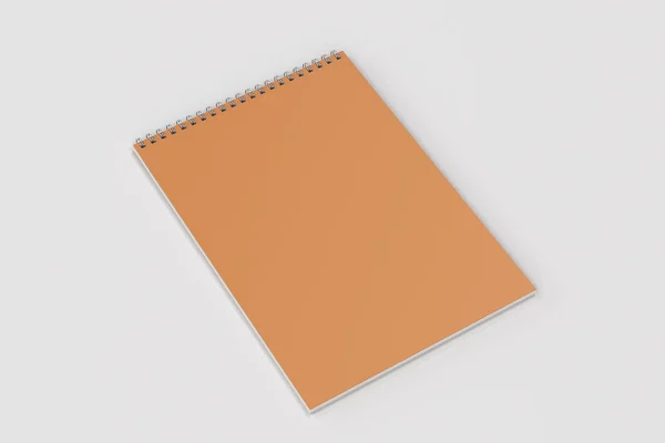 Beyaz adam boş portakal defter metal spiral ile bağlı — Stok fotoğraf