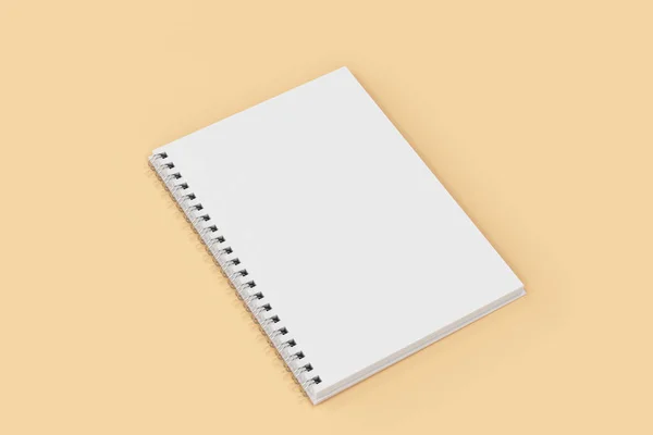 Geopend notebook spiraal gebonden op een oranje achtergrond — Stockfoto