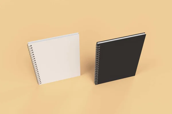 Zwei Notizbücher mit Spiralbindung auf orangefarbenem Hintergrund — Stockfoto