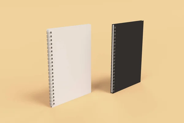 Dos cuadernos con espiral encuadernada sobre fondo naranja —  Fotos de Stock