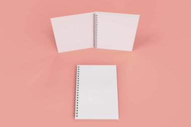 Kırmızı zemin üzerine iki defter spiral ile bağlı