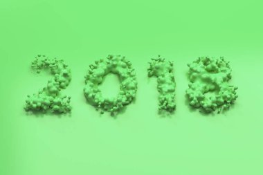 Sıvı yeşil 2018 numarası ile yeşil arka plan üzerinde damla