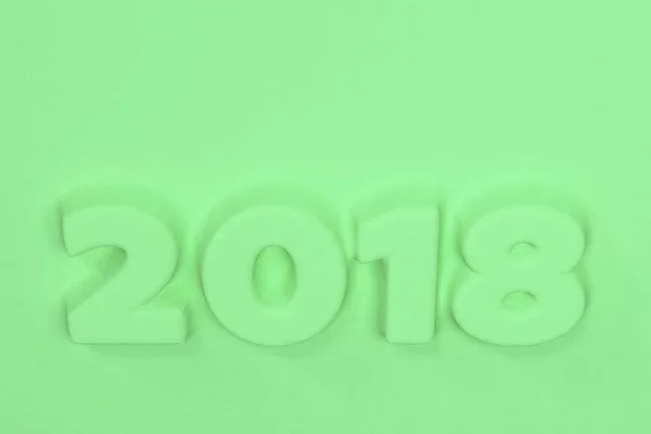 Número verde 2018 baixo-relevo — Fotografia de Stock