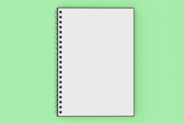 Yeşil arka plan üzerinde bağlı Garı defter spiral