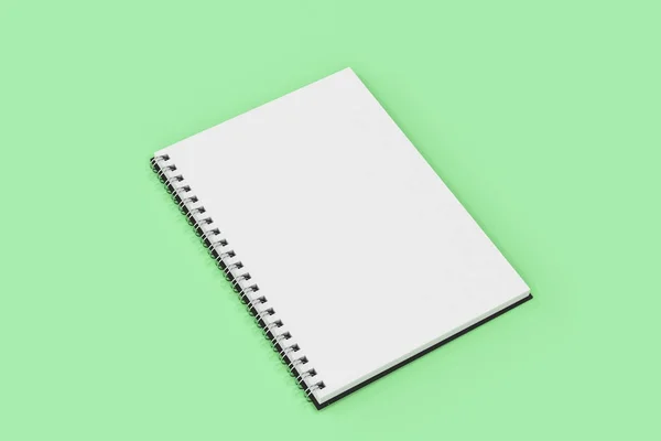 Abrir espiral notebook encadernado no fundo verde — Fotografia de Stock