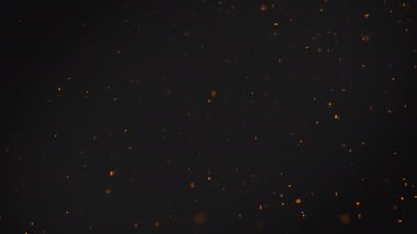 Bokeh parçacıkları yüzen portakal ile soyut backgrond. Havadaki toz. Ağır çekim