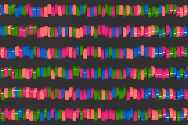 Wzór, niebieski, czerwony i zielony cylinder tabletek na backgro czarny — Zdjęcie stockowe