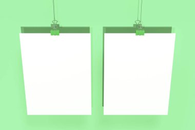 Ciltçi ile iki boş beyaz posterler mockup yeşil backgro klip