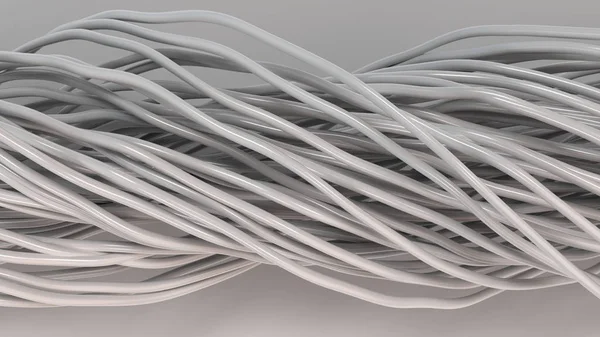 Скрученные белые кабели и провода на белой поверхности — стоковое фото