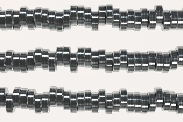 Pattern of brushed metal cylinder tablets on white background