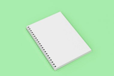 Yeşil arka plan üzerinde bağlı Garı defter spiral