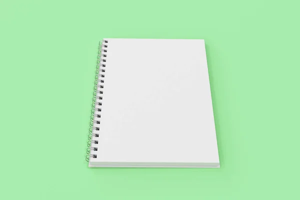 Opporre notebook spirale rilegato su sfondo verde — Foto Stock