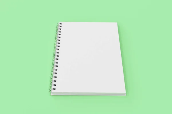 Abrir espiral notebook encadernado no fundo verde — Fotografia de Stock