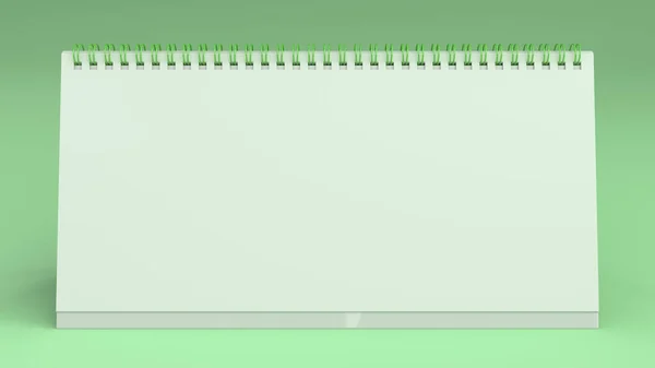 Biały stół kalendarz makiety na zielonej powierzchni — Zdjęcie stockowe