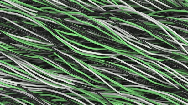 Twisted black, white and green cables and wires on black surface