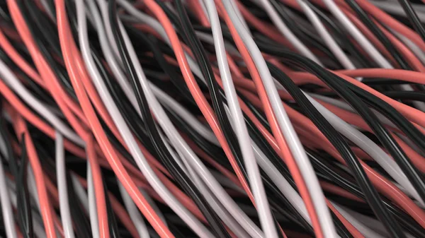 Cabos e fios pretos, brancos e vermelhos torcidos na superfície preta — Fotografia de Stock