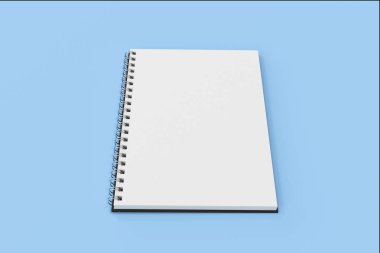 Mavi arka plan üzerinde bağlı Garı defter spiral