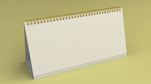 White table calendar mock-up on yellow surface — Stock Photo, Image