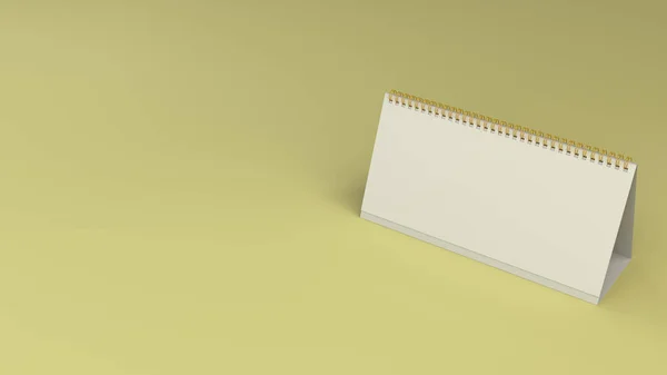 Beyaz masa takvimi mock-up sarı yüzeyi — Stok fotoğraf