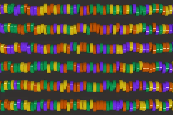 Wzór, żółte, fioletowe i zielone cylindra tabletek na czarny ba — Zdjęcie stockowe