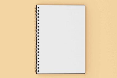 Garı defter spiral turuncu zemin üzerine bağlı