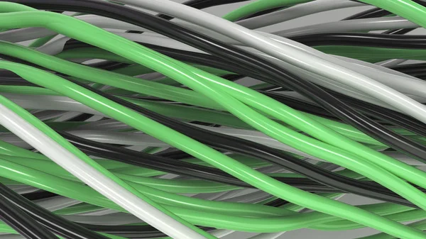 Cabos e fios pretos, brancos e verdes torcidos na superfície branca — Fotografia de Stock