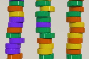 Sarı, mor ve yeşil silindir tabletler üzerinde beyaz ba paterni