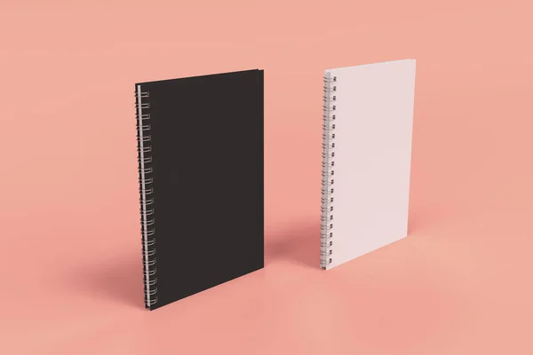 Dos cuadernos con espiral encuadernada sobre fondo rojo — Foto de Stock