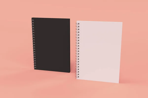 Zwei Notizbücher mit Spiralbindung auf rotem Hintergrund — Stockfoto