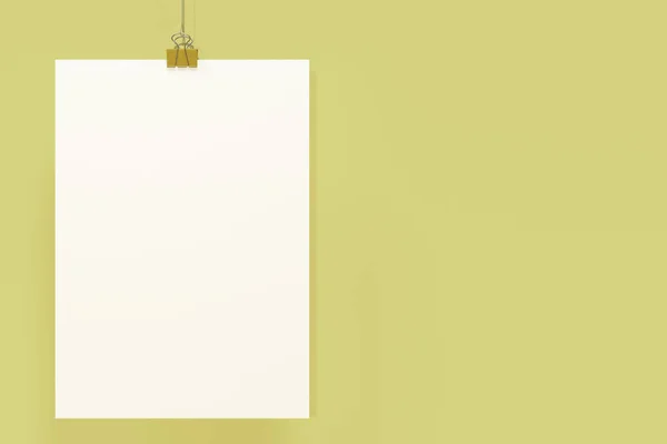 Blank white poster with binder clip mockup on yellow background — Stock Photo, Image