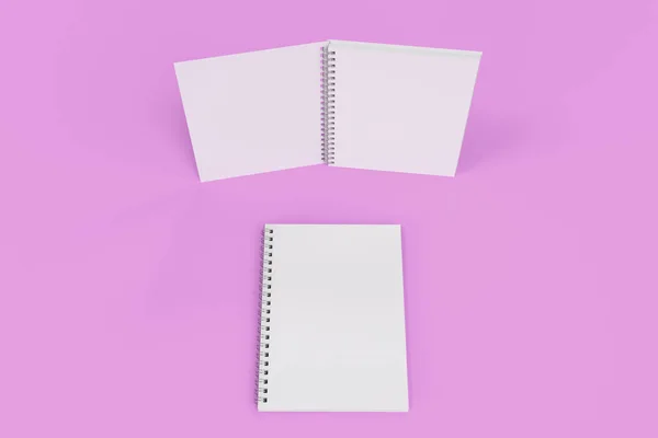 Dos cuadernos con espiral encuadernada sobre fondo violeta — Foto de Stock