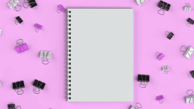 Siyah, beyaz ve mor bağlayıcı klipleri ile boş spiral defter 