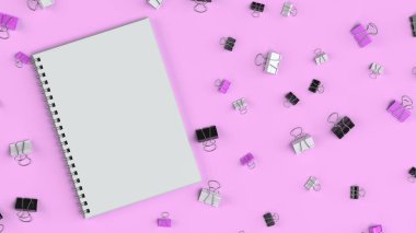 Siyah, beyaz ve mor bağlayıcı klipleri ile boş spiral defter 