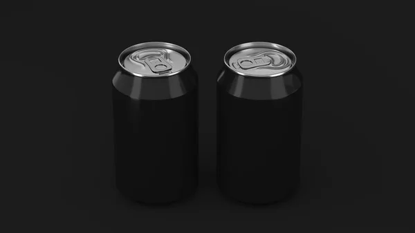 Дві маленькі чорні алюмінієві содові банки маскуються на чорному тлі — стокове фото